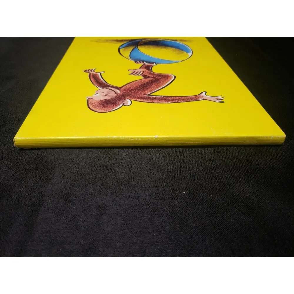 Curious George Plays on a Ball by Margaret and H.A. Rey Picture Wall Art